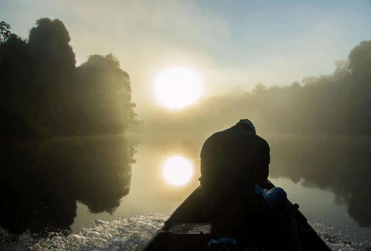 Traveling with a canoe along the Rio Novo, Terra do Meio Ecological Station, Pará, Brazil.