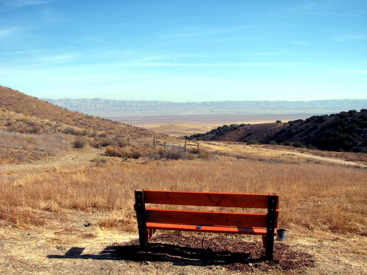 A Fall view of Carrizo Plain National Monument from the Selby Campground. 
This bench is located at an elevation of 2,520 feet at the eastern edge of the campground.
Carrizo Plain is located in eastern San Luis Obispo County, central California.
Mano Seca Group
This bench with its view of the Carrizo Plain is another one installed by the Mano Seca Group and provided free of charge to the public so that they might enjoy the scenic western United States.
All Mano Seca benches are branded and trademarked.
Find all the other Mano Seca benches in the West!