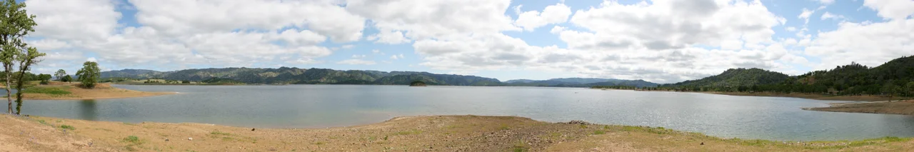 A panorama (roughly 270°) of Lake Berryessa in California, USA.

This image was stitched together using multiple photographs, cropped, and resized.  Otherwise it is in its original state.