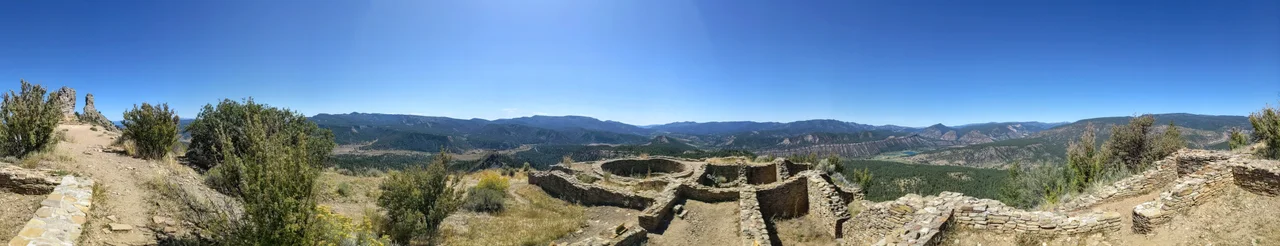 Full 360-degree panoramic view from Chimney Rock National Monument's Great House. From left to right: Companion Rock, Chimney Rock, the valley of Stollsteimer Creek, the Great House, the valley of the Piedra River.