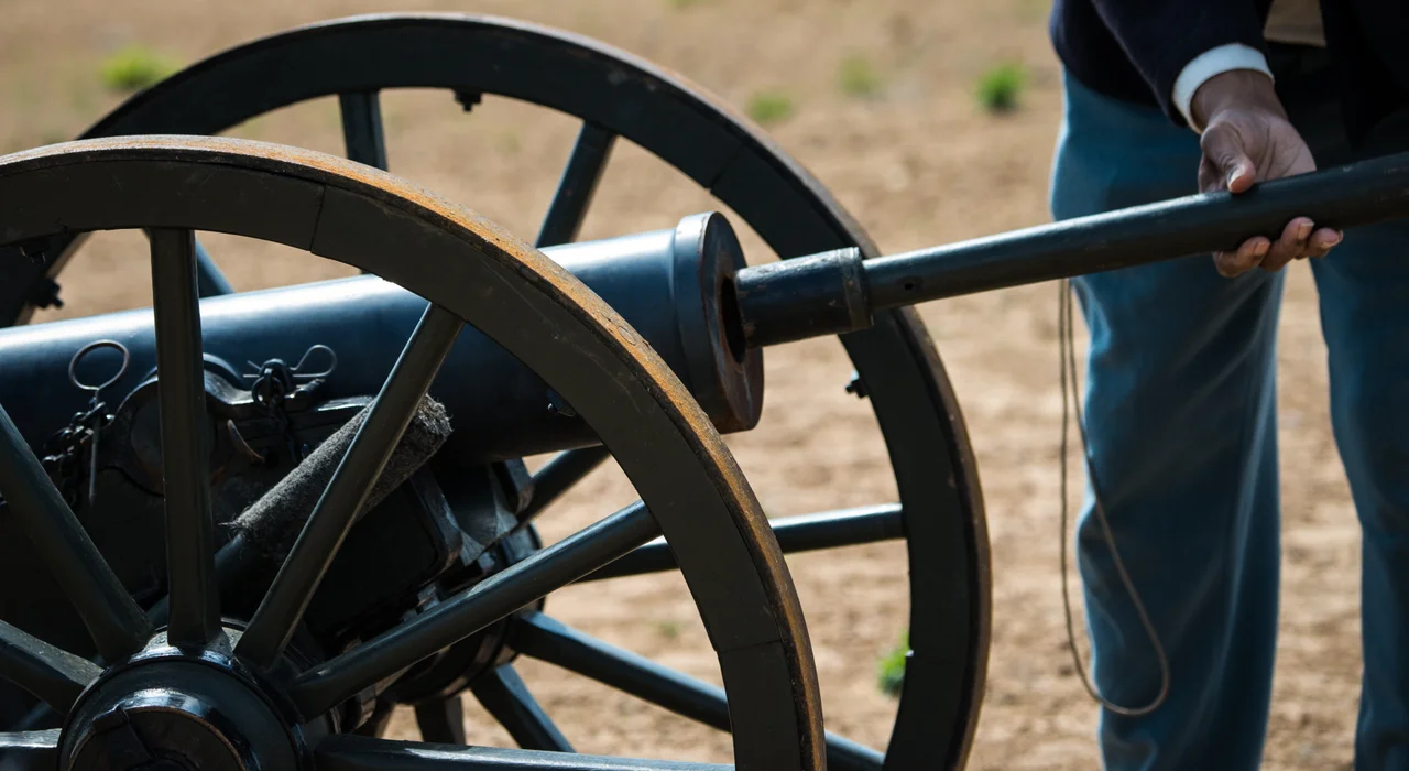 A Civil War era cannon is loaded and fired by Oklahoma Historical Society’s, Ft. Gibson Historic Society staff member Omar Reed and site director Christopher Price who provide living history tours, on the site of the Civil War’s Battle of Honey Springs, in Rentiesville, OK, on Wednesday, April 6, 2015. Mr. Reed’s living history role represents an era from 1820 to post Civil War. The current one-room visitor center is set to relocate into the future Honey Springs Visitors’ Center that will be a multi-purpose community center/public library/and battlefield interpretive center.  The federal involvement includes the National Park Service, as well as all three agencies of the U.S. Department of Agriculture (USDA) Rural Development (RD), Rural Business Service (RBS), Rural Utilities Service (RUS), and Rural Housing Service (RHS).  USDA photo by Lance Cheung.