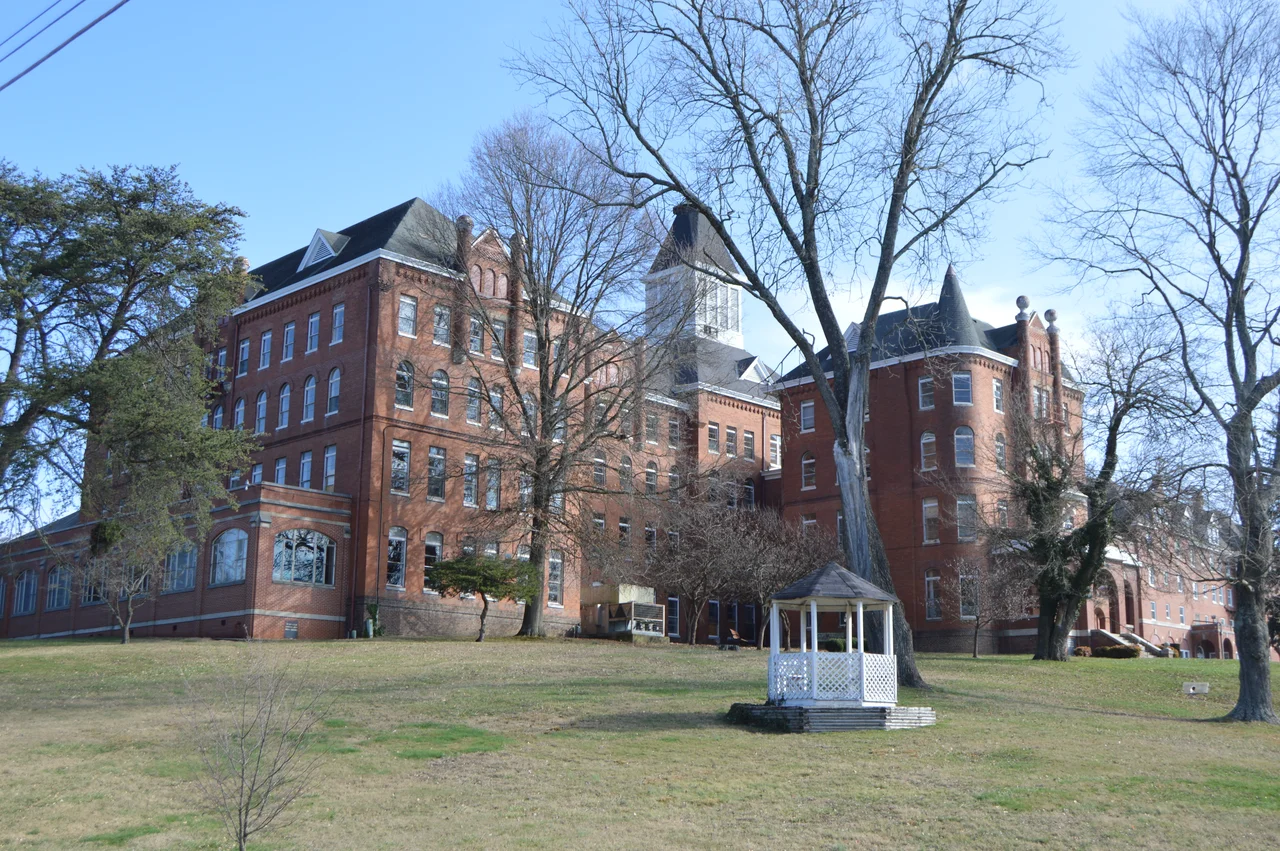 Southern front and western side of buildings (at center, the Main Building, constructed 1890) on the campus of the former Virginia Intermont College, located on Moore Street north of Buchanan Street in Bristol, Virginia, United States.  The central part of the campus is listed on the National Register of Historic Places.