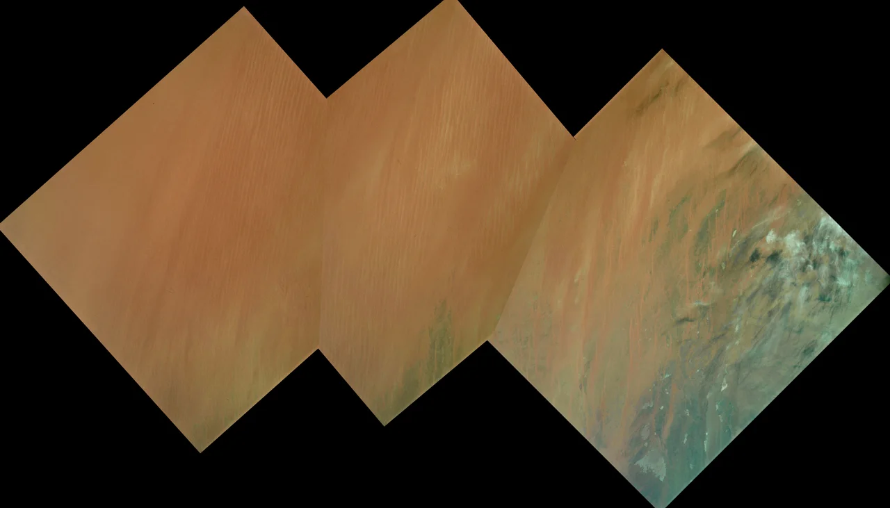 Oblique view of part of the ergs of the El Djouf region of the Sahara Desert in Mauritania and Mali, Africa.  Mosaic of Apollo 9 photographs from orbit.