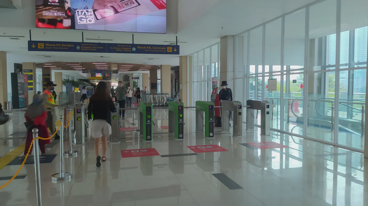 Tap in and out gate in BNI City Station for commuter train's passenger