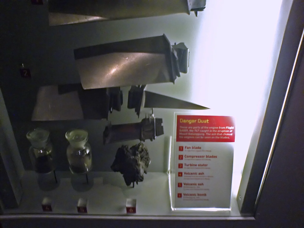 Some elements of the engines from British Airways Flight 9, damaged by volcanic ash (shown at the "Auckland Museum")
Note that these parts were on loan at the Museum and were returned to their owner in 2011, so are no longer on display nor part of the Museum's collection.
Parts (from top):

Fan blade
Compressor blade
Turbine stator