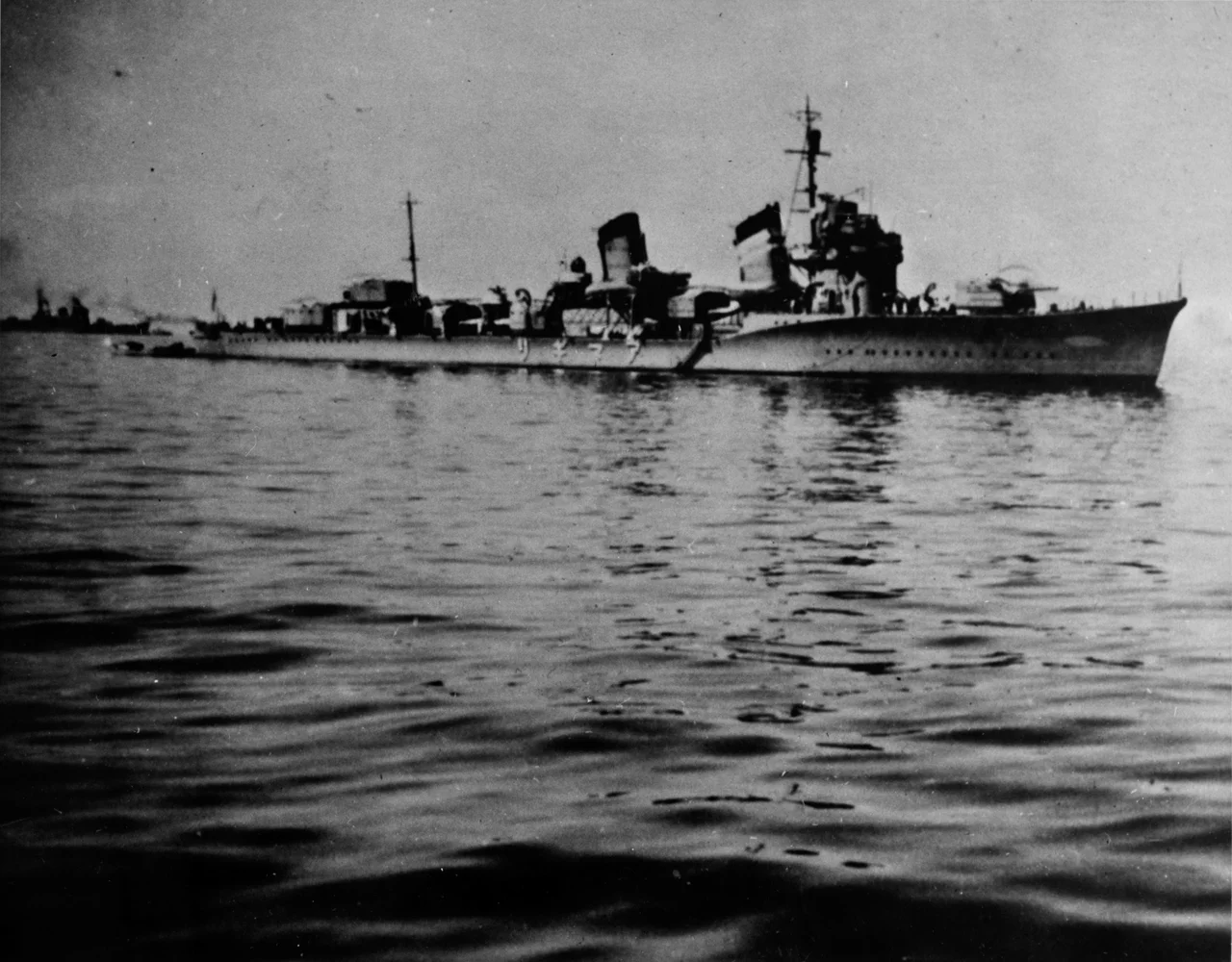 HIJMS Destroyer Amagiri.
Removed caption read: Photo # NH 50198  Japanese destroyer Amagiri, prior to World War II. A Nachi-class heavy cruiser in the far left background.