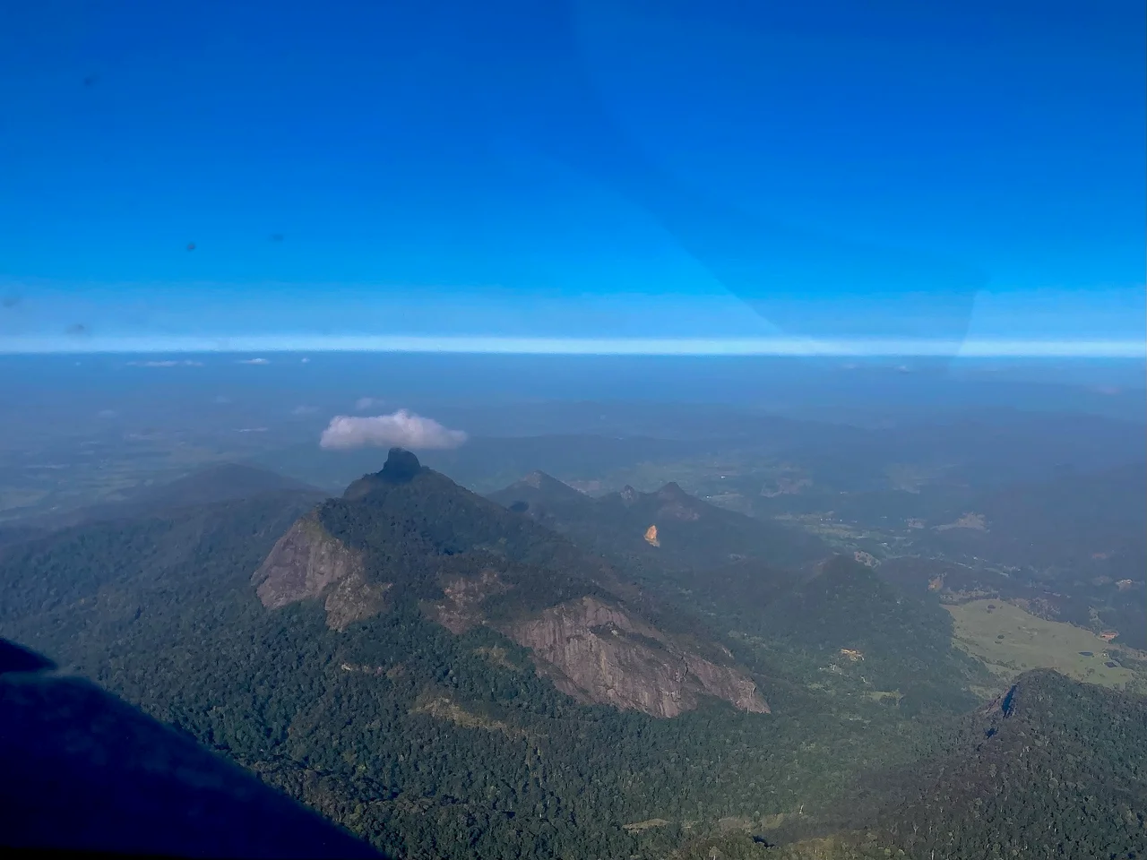 Small cloud over Mount Warning, photographed from an aeroplane.