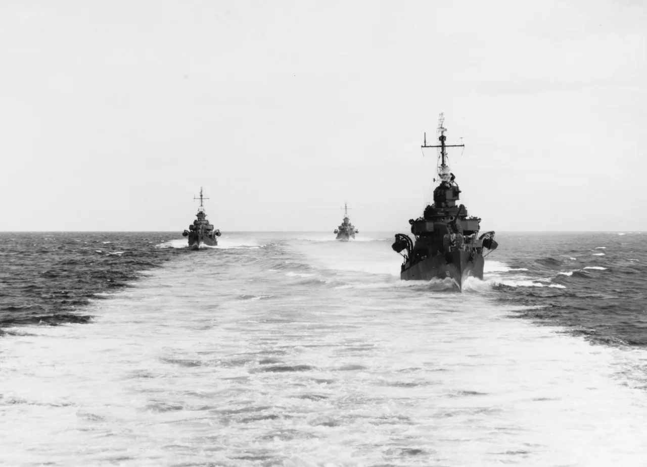 Three of the U.S. Navy Destroyer Squadron 21's ships underway in the Solomon Islands, 15 August 1943. The ships are (from front to rear): USS O'Bannon (DD-450), USS Chevalier (DD-451) and USS Taylor (DD-468). Photographed from USS Nicholas (DD-449), while the ships were enroute to the landings at Vella Lavella, which took place on the same day.