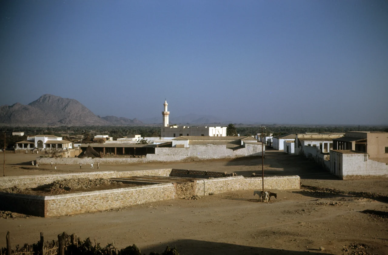 Pictures taken while stationed at U.S. Army Kagnew Station, Asmara, late 1940s. 

Probably polo field, looking across town to the mosque's tower.