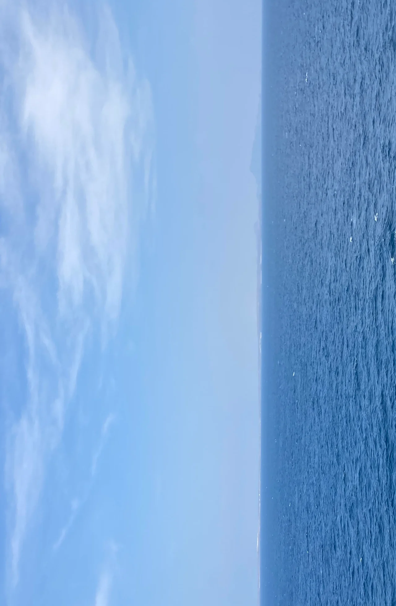 The Strait from Mid-Channel, December 2003.  Yemen is in the distance and looking the other way the Djibouti coast is just visible.
