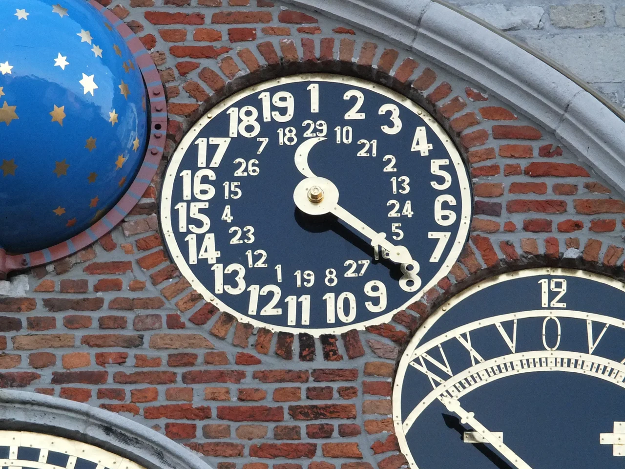 The Metonic cycle and the epact on the Jubilee clock of the Zimmer tower. The Zimmer tower (Dutch: Zimmertoren) is a tower in Lier, Belgium, also known as the Cornelius tower, that was originally a keep of Lier's fourteenth century city fortifications. In 1930, astronomer and clockmaker Louis Zimmer (1888–1970) built the Jubilee (or Centenary) Clock, which is displayed on the front of the tower.