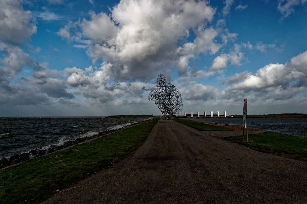 Lelystad - Houtribdijk - Exposure (of Crouching Man) 2010 by Antony Gormley - View North
