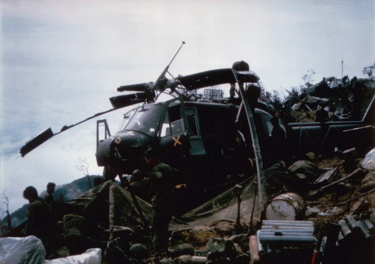 LRPs on Signal Hill directing artillery on enemy trucks in A Shau Valley below.