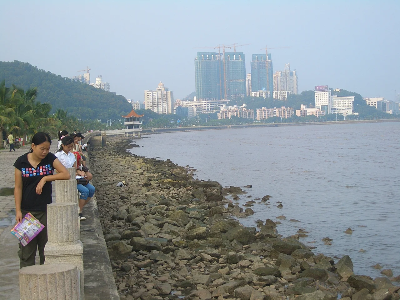 Qinglü Embankment in Zhuhai, along the shore of the Pearl River Estuary. Looking north east from Gongbei toward Jiuzhou Harbor.